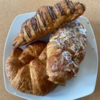 Premium Croissant · Plain, Almond or chocolate Croissant