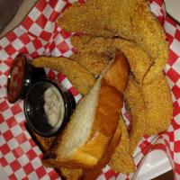 3pc Catfish Dinner  · 3 Golden Crispy Fried Catfish Fillets w/ 2 sides along with a slice of perfectly Toasted and...