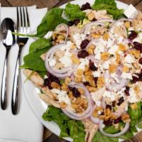 Spinach Salad · Fresh Spinach with iceberg and romaine, red onions, chopped walnuts, feta cheese crumbles an...