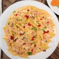 Penne Pasta with Vodka Sauce Dinner · Served with shrimp for additional charge. Served with grilled chicken breast strips for an a...