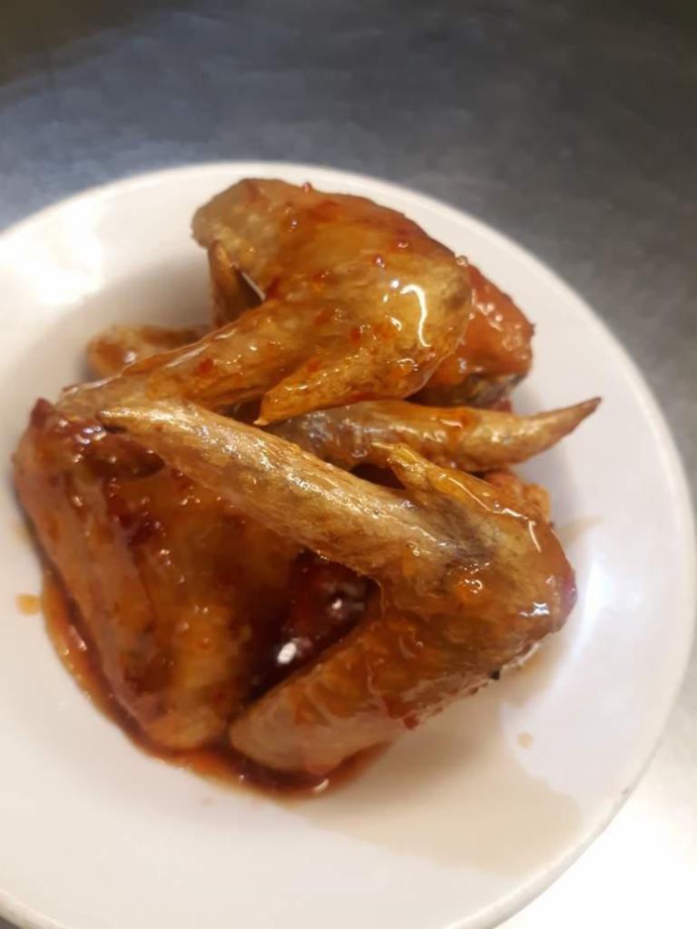 Wings (drummies & flats) · Have em tossed in any of our 9 dry rubs or our 5 sauces: Buffalo, barbecue, ghost pepper glaze, sweet honey, or teriyaki.