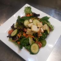 House Salad  · Mixed greens, croutons, tomatoes, shredded carrots and cucumbers. 