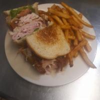 Clubhouse · Smoked turkey, black forest ham, bacon, lettuce, tomato and mayo on your choice of bread.