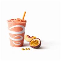Caribbean Passion Smoothie · Pear White Grape Mango Orange Passion Juice Blend, Orange Sherbet, Strawberries, Peaches (Co...