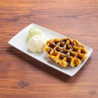 Belgium Waffle · 2 scoop of ice cream and 1 flavor drizzle of your choice.