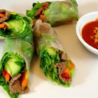 Lemongrass Beef Steak Fresh Roll · (2 pieces). Filled with vermicelli noodles, lettuce, basil and served with peanut dipping sa...