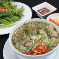Rare Tender Steak and Beef Meatballs Pho · Served with bean sprout, basil, lime, jalapeno, onions. 