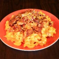 Mac n' Cheese w/Cornbread · topped with a three cheese blend and served with cornbread