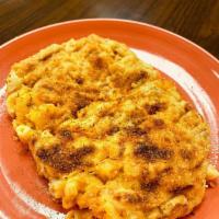 Baked Crab Mac n' Cheese · Our homemade macaroni and cheese topped with crab dip, bread crumbs, grated parmesan cheese,...