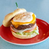 Maryland Crab Burger · Topped with crab dip, cheddar cheese, Old Bay, lettuce, tomato and raw onion. Served on a to...