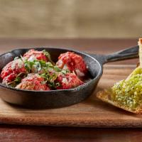 Cast Iron Meatballs · reggiano parmigiano | garlic bread | garden basil
