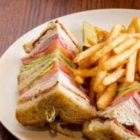 Traditional Club · turkey | ham | bacon | iceberg | tomato | mayo | sourdough
