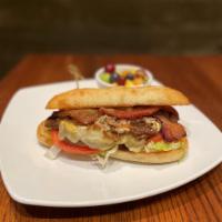 Sonoran Steak Sandwich · southwest spiced chuck steak | pepper jack | smoked bacon | iceberg | tomato | caramelized o...