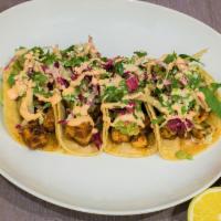 Street Tacos · ranchero beans | chipotle aioli | guac | napa slaw | cotija