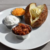 Baked Potato · A traditional baked potato, served with all the fixin's