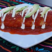 Wet Burrito · Choice of meat, served with rice and beans, onion, cilantro, wet in spicy salsa, cheese, sou...