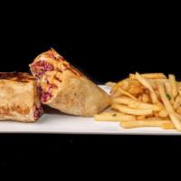 Impossible Cali Burrito Combo · Our house seasoned Impossible Meat, guac, cheese sauce, coleslaw, and fries topped with our ...