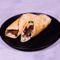 Eggplant Sandwich · Fried eggplant, feta cheese and lettuce wrapped in pita bread and tzatziki sauce.