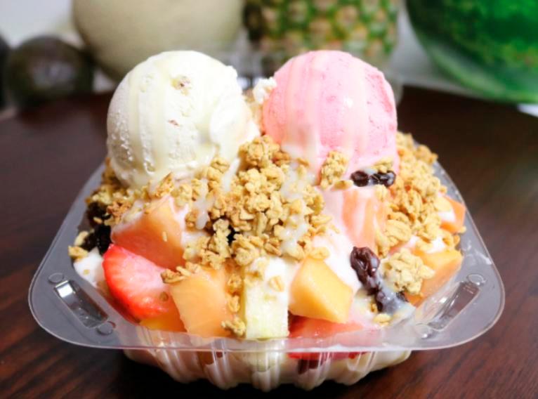 Super Bionico · Fresh strawberries, apples, bananas, papaya and cantaloupe covered by our special sweet cream topped of with granola raisins and coconut and 2 scoops of ice cream of your choice.
