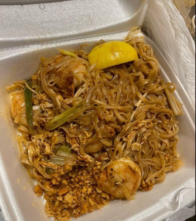 Pad Thai · Stir fried rice noodle with egg and tamarind sauce, green onions, bean sprouts, tofu and ground peanut on the side.