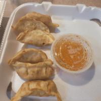 6 Pot Stickers · A crescent shaped dumpling filled with pork, steamed and then fried. Served with sweet and s...