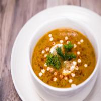 Lentil Soup · Green lentil, carrots, garlic, extra virgin olive oil, served with pita bread.