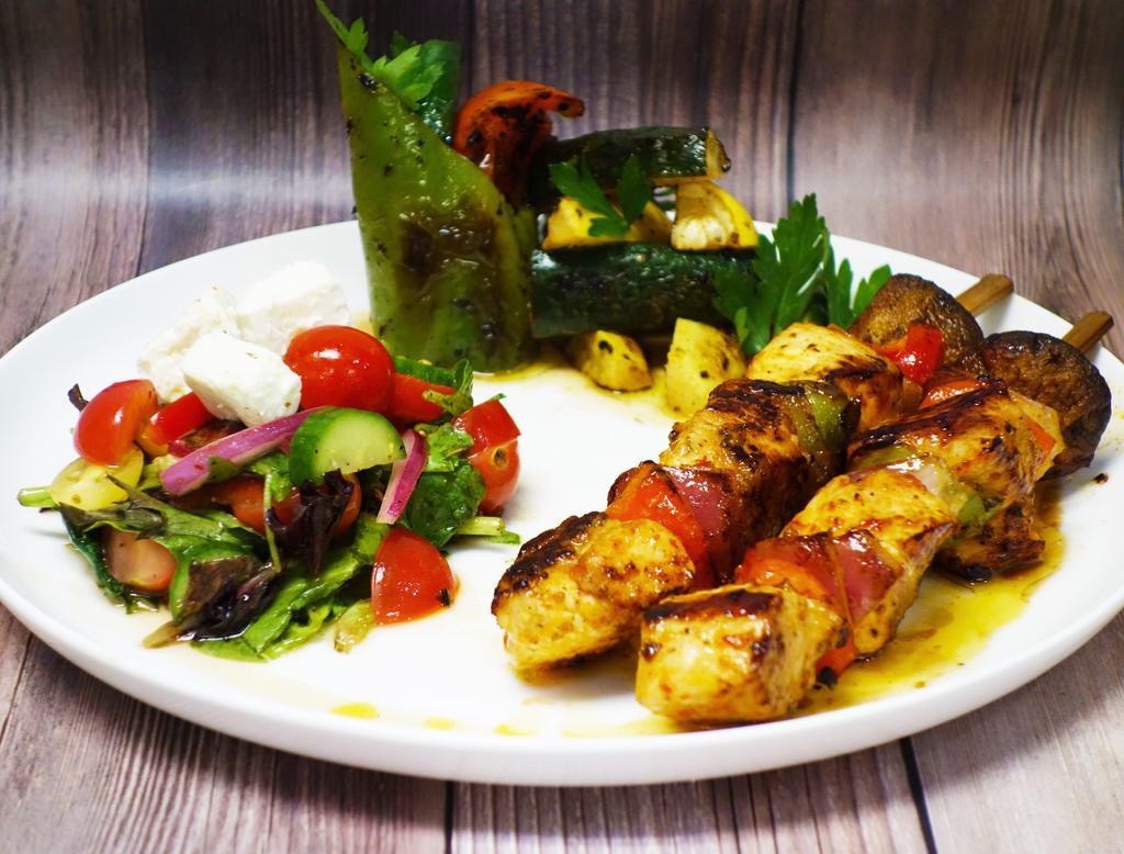 Keto Chicken Kebab · 2 chicken skewers, spring salad, grilled veggies.