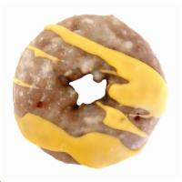 KGF Lemon Poppyseed · We infuse our KGF Plain Donut with fresh lemon and a perfect amount of poppy; then it’s coat...