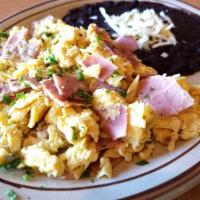 Huevos con Jamon  · Todo Mexico. Scrambled eggs with ham. Served with black beans and 2 corn tortillas.