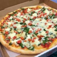 Veggie Pizza Slice · Fresh spinach,tomatoes, and ricotta cheese.