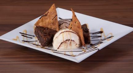 Brownie Sundae · Vanilla and chocolate ice cream with moist and homemade cinnamon chips.