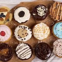 Dozen Assorted Centerfilled Cupcakes · Chef’s choice! An assortment of our current centerfilled cupcakes.