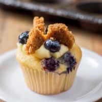 Blueberry Cheesecake · Vanilla blueberry cake with cheesecake baked in, topped with pastry cream, homemade graham c...