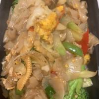 Kee Mow Vegetable · Stir-fried with egg, fat noodle, onion, bell pepper, mushrooms, basil, broccoli, cabbage, ba...