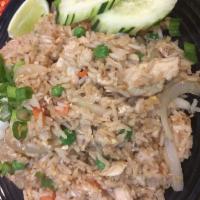 Fried Rice Chicken · Stir-fried rice with eggs, onions, peas and carrots.