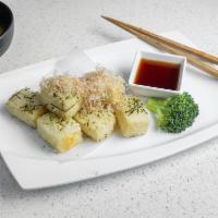 Agedashi Tofu · 8 pieces. Crispy deep fried tofu served in flavorful tsuyu sauce with green onion, and bonit...