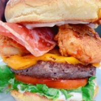 Thickass Burger · Potato bun, impossible 2.0 patty, follow your heart cheddar cheese, lettuce, tomato, sauteed...