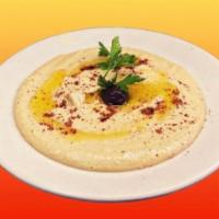 Hummus with Pita Bread · Blended garbanzo bean, tahini sauce, olive oil and pita bread.