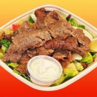 Gyro Salad · Lettuce, tomatoes, onions, cucumbers, black olives, lamb and beef.