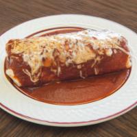 Wet Burrito · Large flour tortilla stuffed with your choice of meat, rice, beans, onions and cilantro.