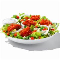 Buffalo Chicken Salad · Mix of romaine iceberg lettuce stacked breaded chicken tossed in wing sauce. Topped wth toma...