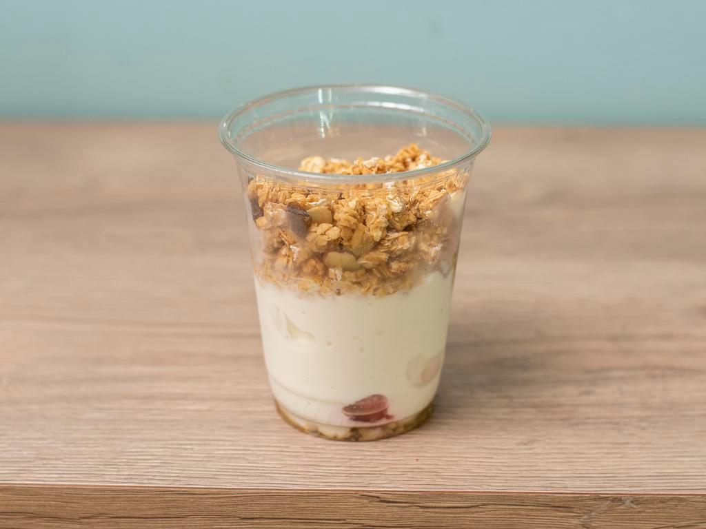 Yogurt Parfait · Organic agave, plain Greek yogurt, granola and seasonal fruits.