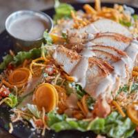 Smoked Chicken Salad · Choice of meat over fresh greens, topped with tomato, cheese, tortilla strips, and your choi...