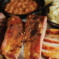 2 Meats Combo · Pick 2 of our signature smoked meats along with 2 sides.