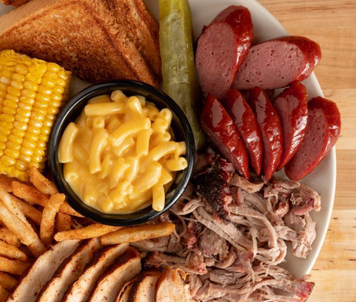 3 Meats Combo · Pick 3 of our signature smoked meats along with 2 sides.
