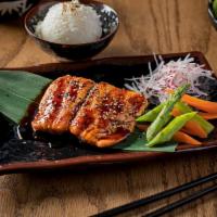 Salmon Teriyaki · Salmon marinated in homemade teriyaki sauce. Served with white rice, house salad, and miso s...