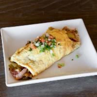 Southwest Omelet · Diced ham, Jack cheese, green chile, onion, choice of side.