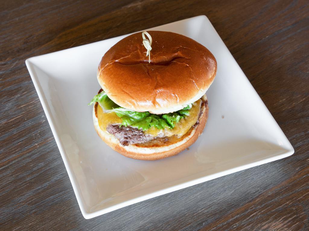 Classic Burger · Brioche bun, burger, substitute beyond burger for an additional charge, lettuce, tomato, mayo, cheese.
