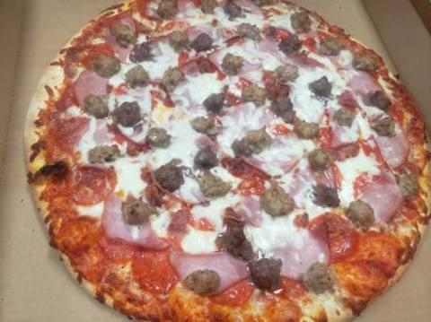 10'' Small 5 Meat Pizza · Our signature marinara sauce, mozzarella cheese, Canadian bacon, pepperoni, real bacon bits, ground beef, Italian sausage, and topped off with more mozzarella cheese.