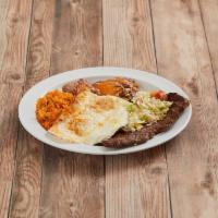 Steak and Eggs · 2 pieces eggs smothered, served with beans.